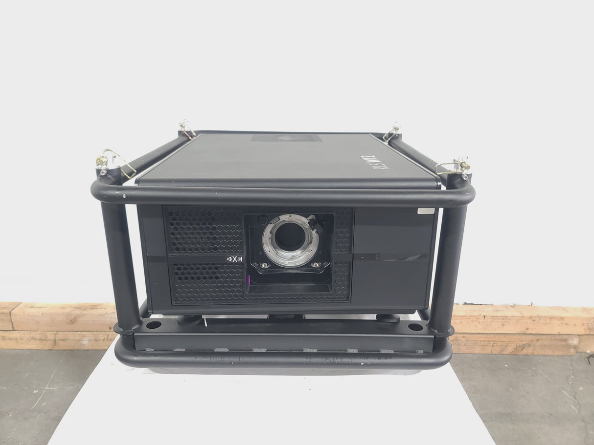 Barco RLS W12 11,000 Lumens WUXGA 1-Chip DLP (Lamp Hours 342 & 345) Large Venue Projector w/ (4) Mounting Clamps, Remote, Extra Lamp & PSU Cable in Wheeled Road Case (NO LENS)