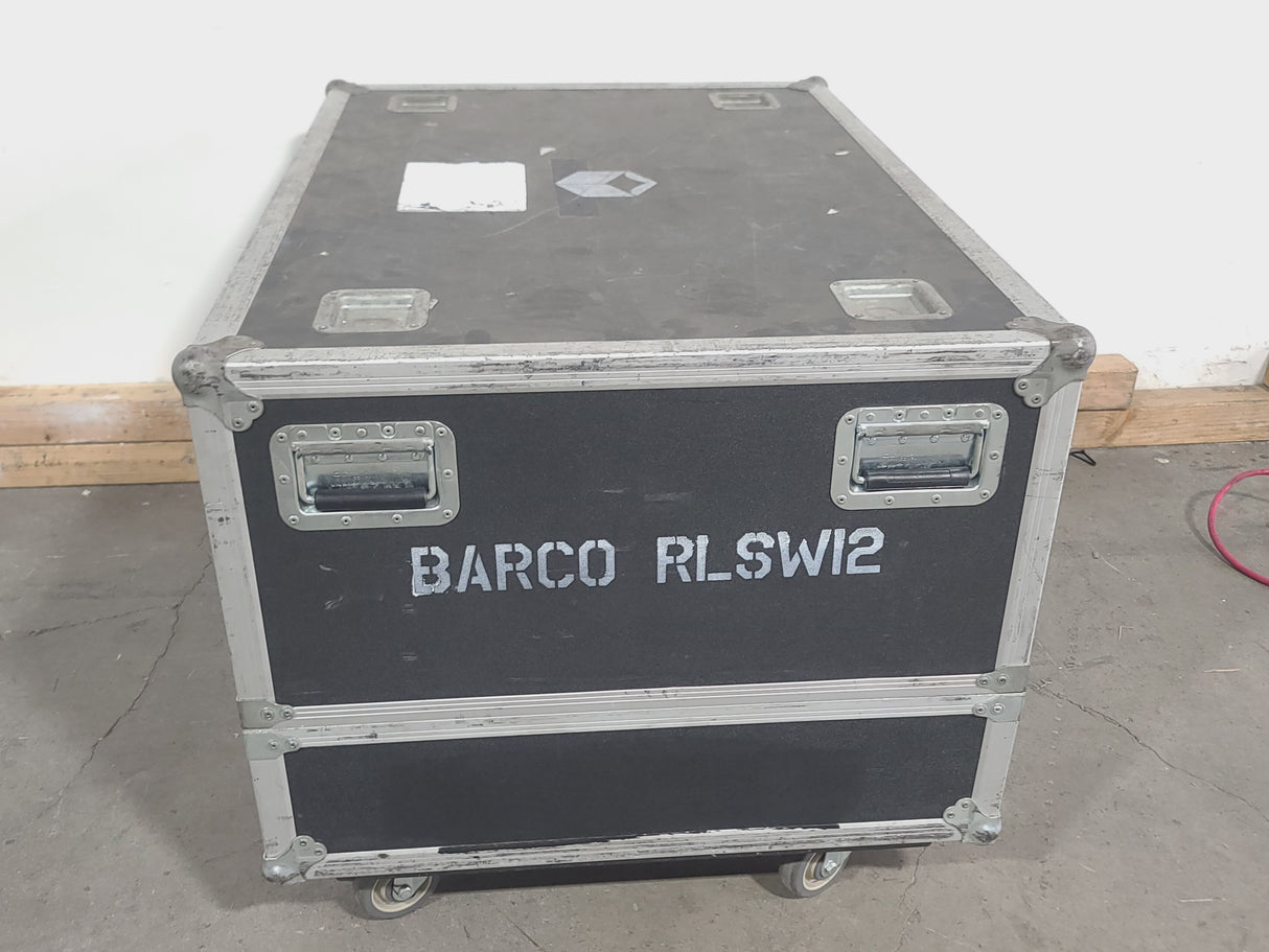 Barco RLS W12 11,000 Lumens WUXGA 1-Chip DLP (Lamp Hours 406 & 407) Large Venue Projector w/ (4) Mounting Clamps, Remote, Extra Lamp & PSU Cable in Wheeled Road Case (NO LENS)