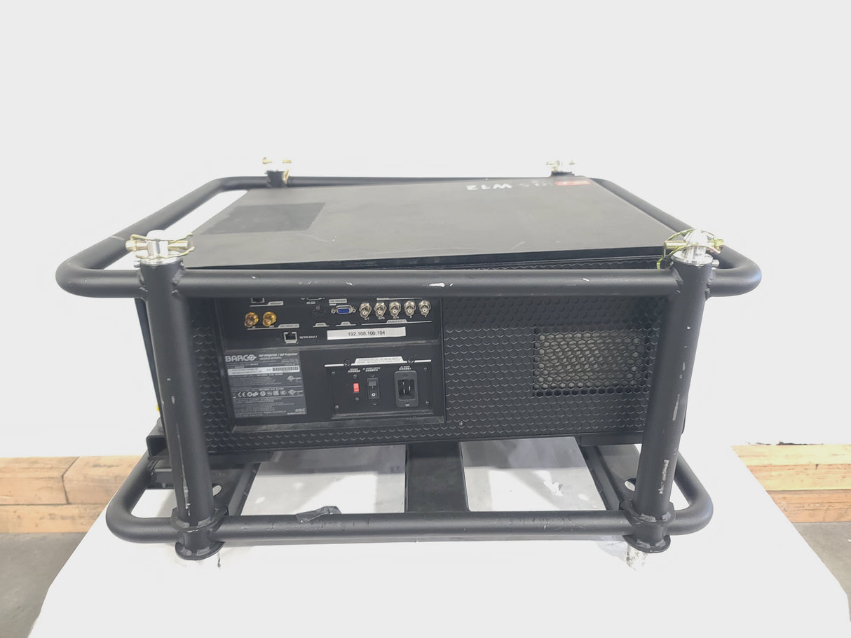 Barco RLS W12 11,000 Lumens WUXGA 1-Chip DLP (Lamp Hours 581 & 978) Large Venue Projector w/ (4) Mounting Clamps, Remote, Extra Lamp & in Wheeled Road Case (NO LENS)