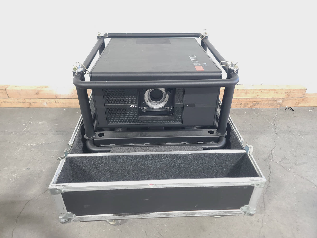 Barco RLS W12 11,000 Lumens WUXGA 1-Chip DLP (Lamp Hours 581 & 978) Large Venue Projector w/ (4) Mounting Clamps, Remote, Extra Lamp & in Wheeled Road Case (NO LENS)