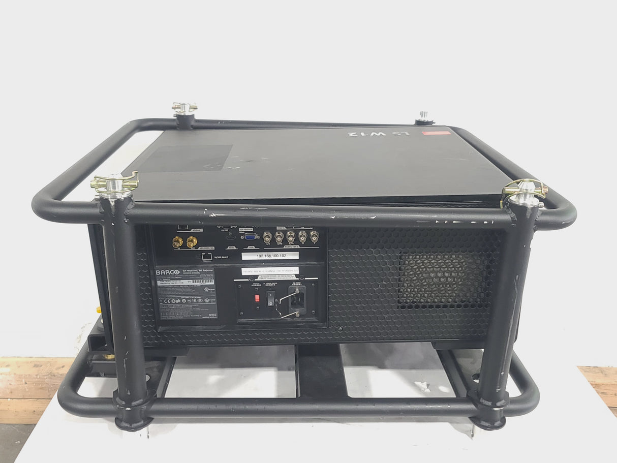 Barco RLS W12 11,000 Lumens WUXGA 1-Chip DLP (Lamp Hours 642 & 642) Large Venue Projector w/ (4) Mounting Clamps, Remote, Extra Lamp & PSU Cable in Wheeled Road Case (NO LENS)