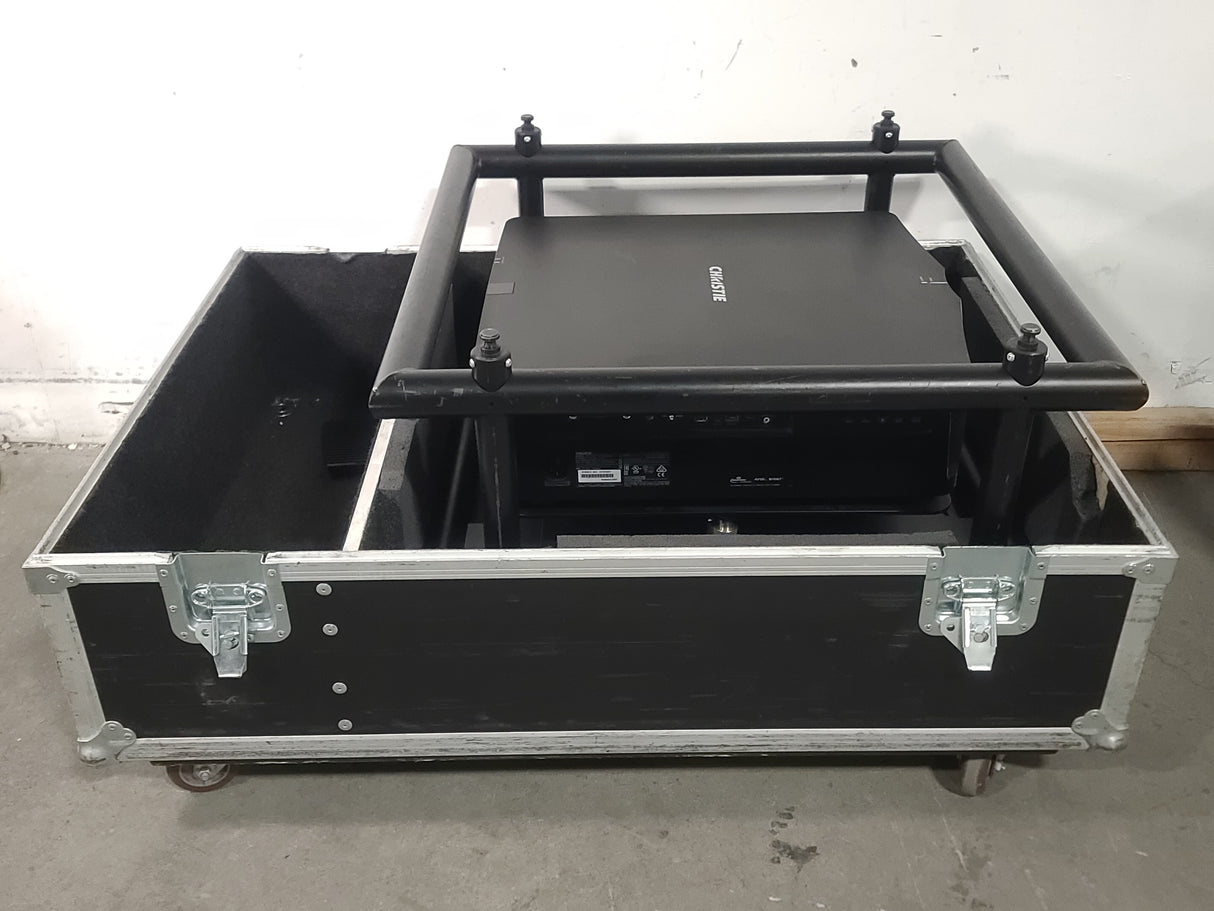 Christie D12HD-H (Lamp 1 84, Lamp 2 84 Hours) 10,000 Lumens HD 0.95" DLP x 1 1080P Large Venue Projector (NO LENS) In Wheeled Road Case (NEEDS REPAIRS)