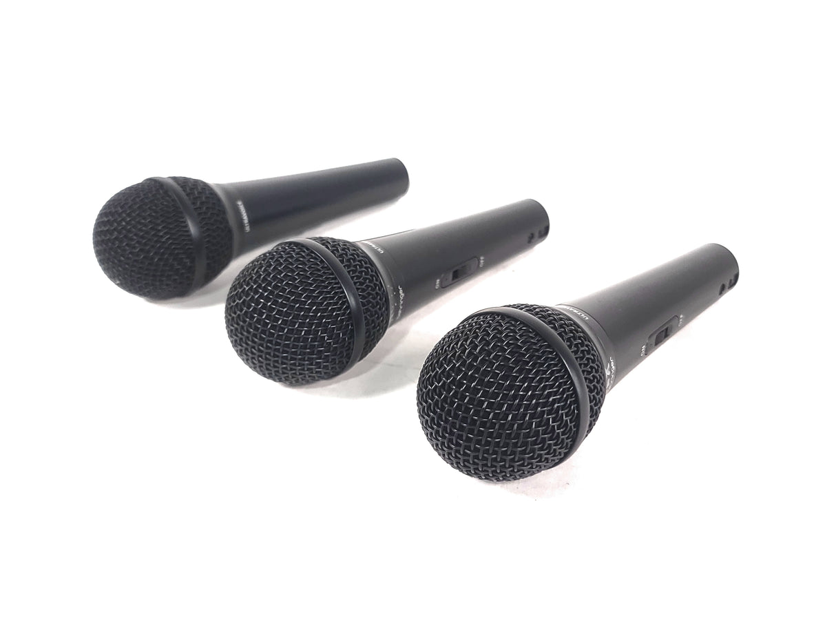 (3) Behringer XM1800S Wired Microphones w/ (3) Microphone Clips in Hard Carry Case