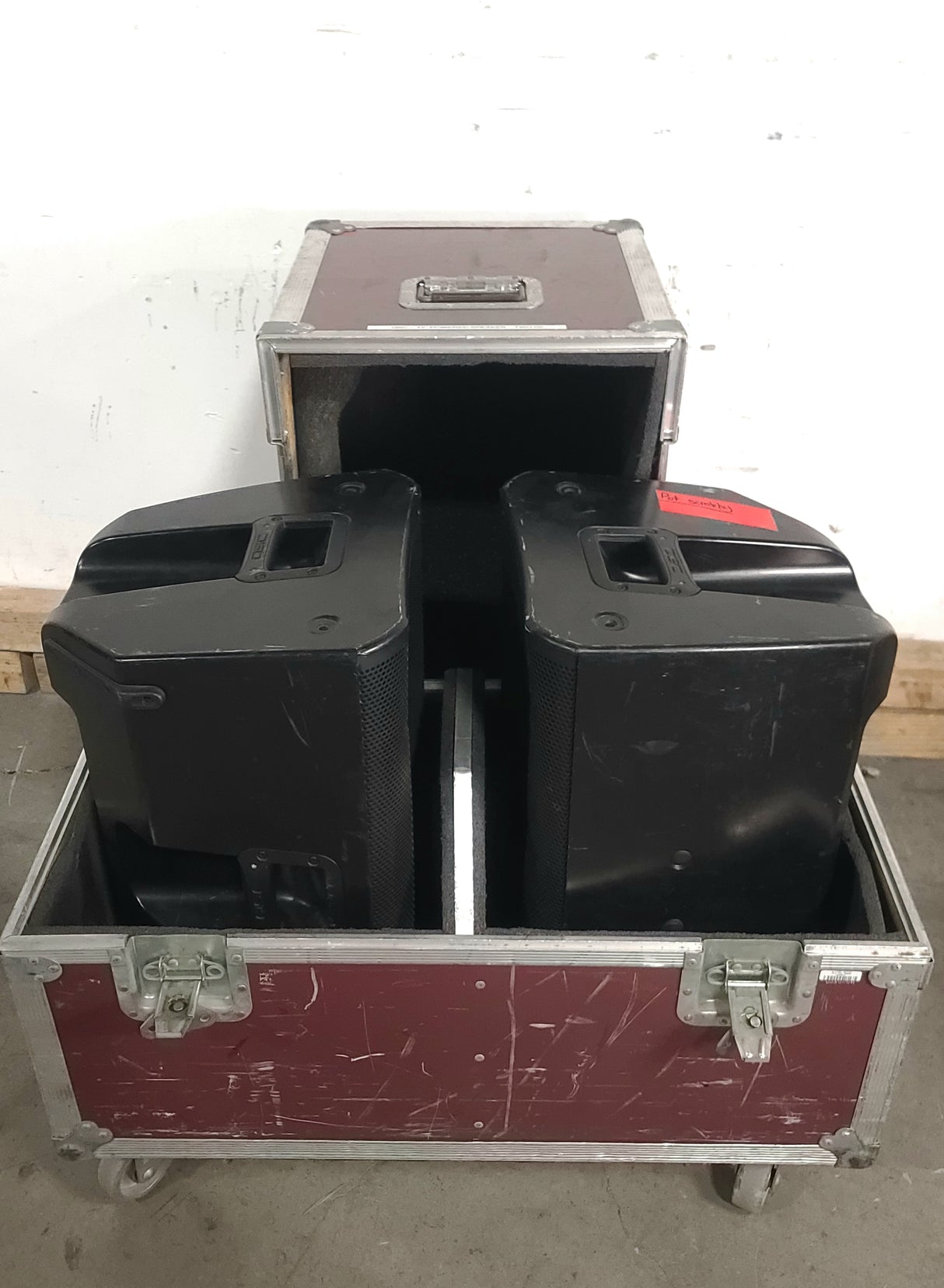 (2) QSC K12 Powered Speakers in Wheeled Road Case