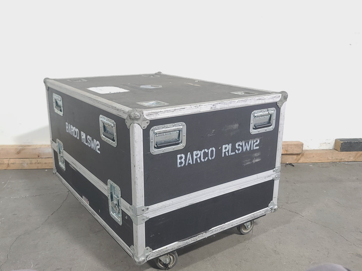 Barco RLS W12 11,000 Lumens WUXGA 1-Chip DLP (Lamp Hours 642 & 642) Large Venue Projector w/ (4) Mounting Clamps, Remote, Extra Lamp & PSU Cable in Wheeled Road Case (NO LENS)