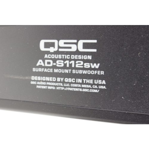 qsc-ad-s112sw-small-format-surface-mount-subwoofer label